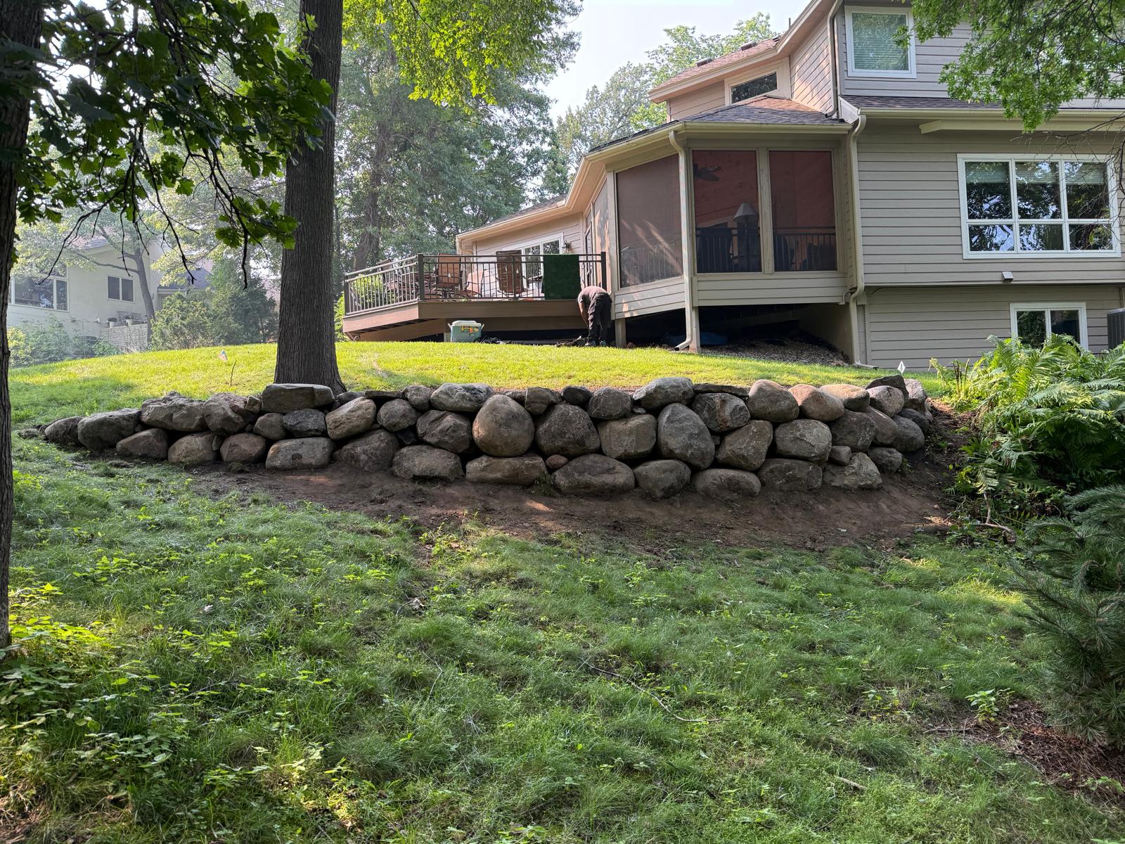 Natural boulder retaining wall