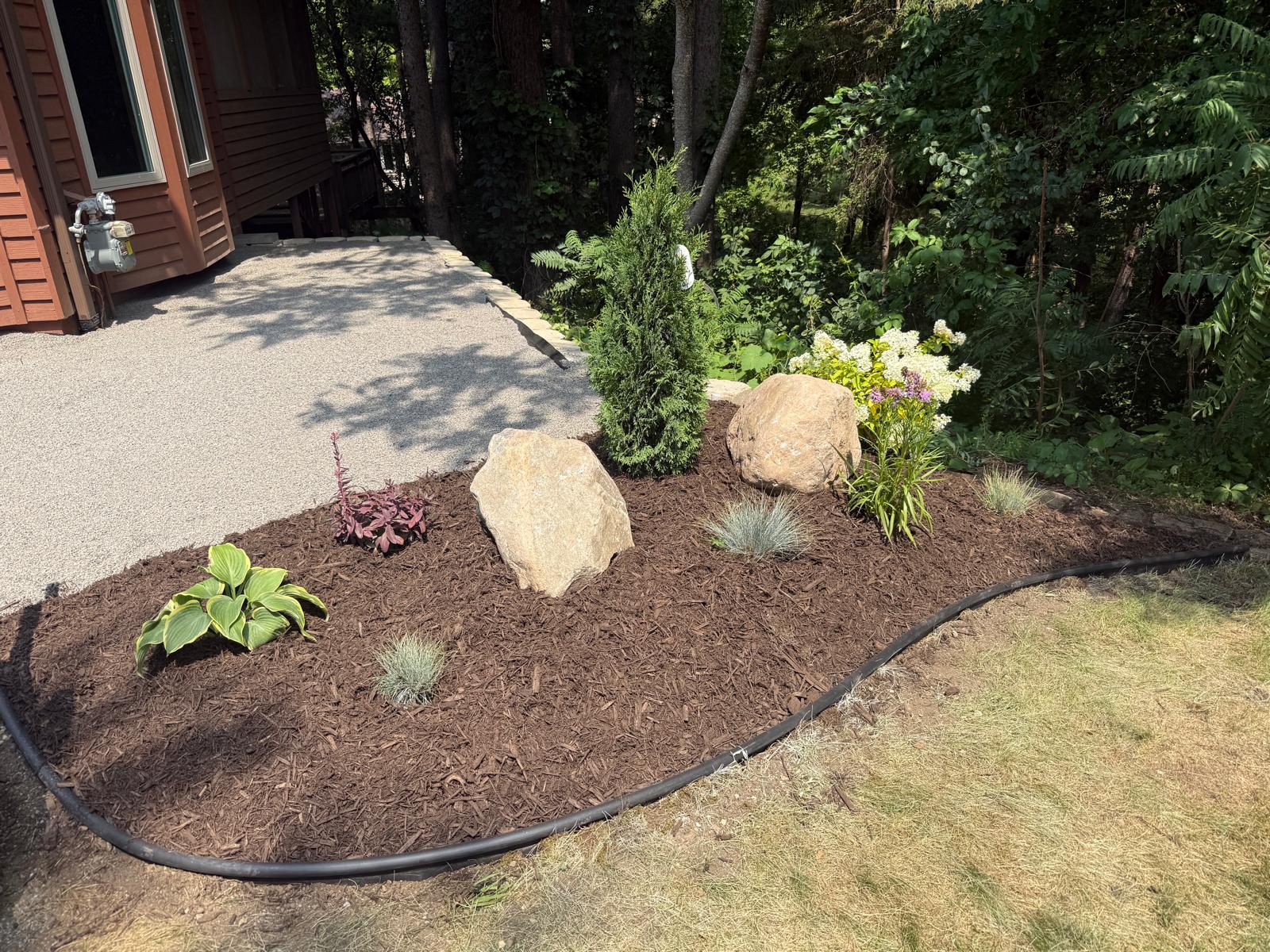 Curved paver walkway with circular inlay